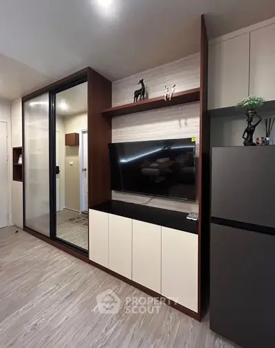 Modern living room with sleek TV unit and stylish decor
