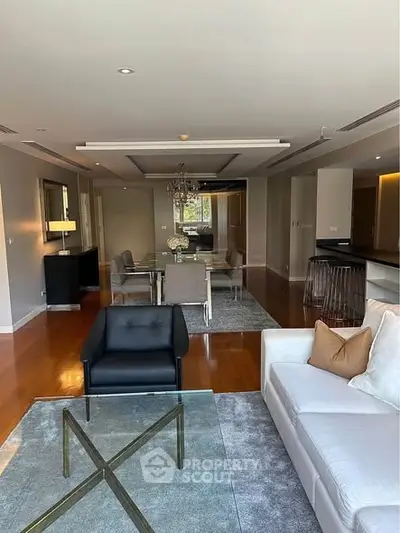 Spacious modern living room with elegant furnishings and open layout