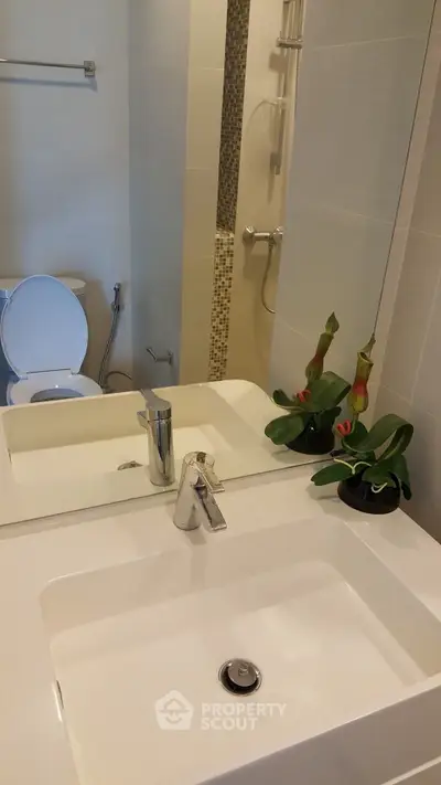 Modern bathroom with sleek sink and stylish decor