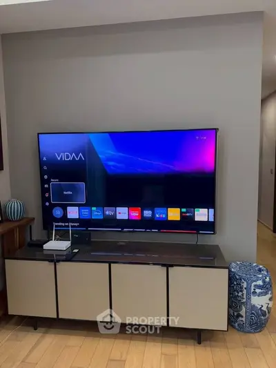 Modern living room with sleek TV setup and stylish decor