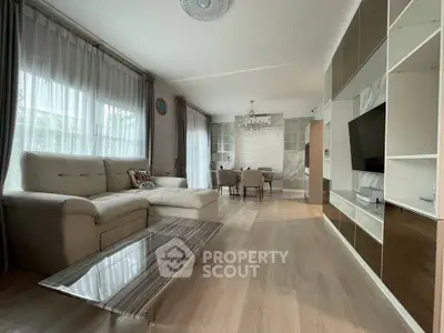 Spacious modern living room with elegant decor and natural light