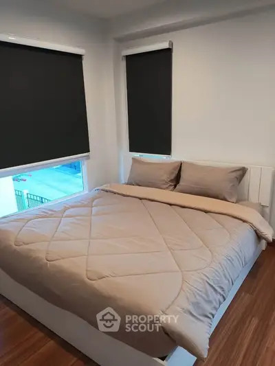 Cozy bedroom with modern design and natural light