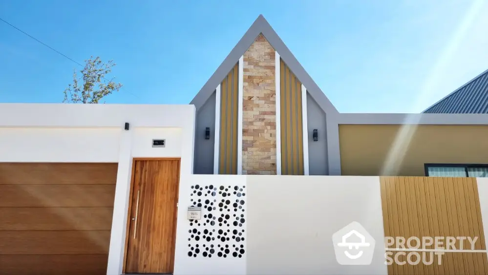 Modern architectural house facade with unique stone and wood design elements