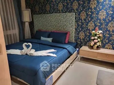 Luxurious bedroom with elegant wallpaper and cozy bedding, perfect for relaxation.