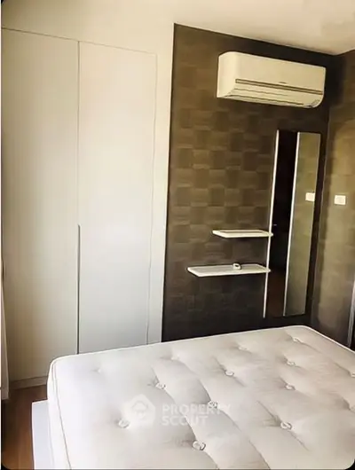 Modern bedroom with air conditioning and stylish decor