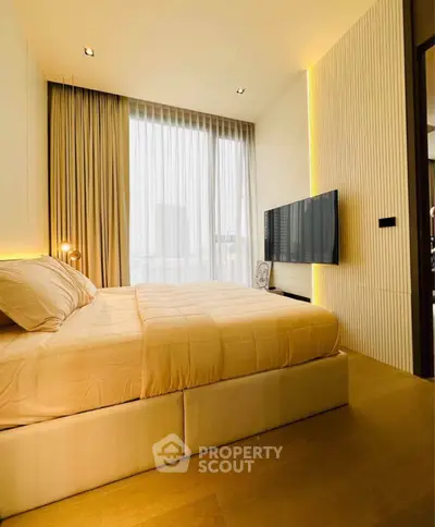 Luxurious bedroom with modern decor and floor-to-ceiling windows