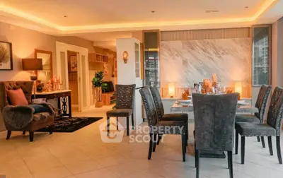 Luxurious dining and living area with elegant decor and ambient lighting in a modern apartment.