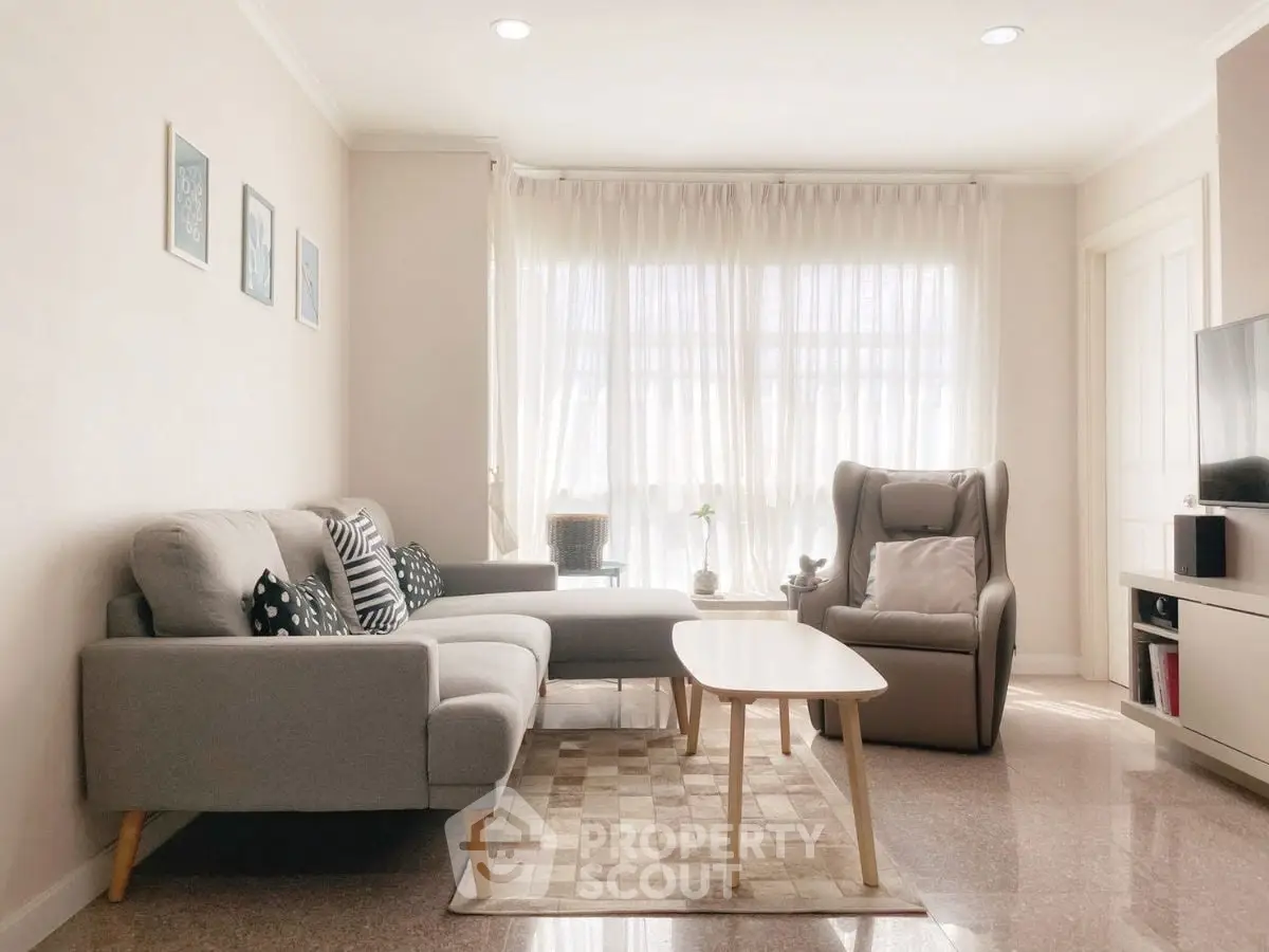 Bright and cozy living room with modern furniture and natural light
