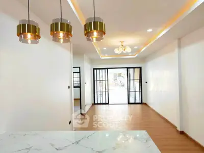 Spacious modern living room with elegant lighting and open layout