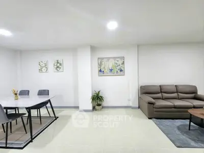 Spacious modern living room with dining area and stylish decor