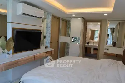 Luxurious bedroom with modern decor and ensuite bathroom