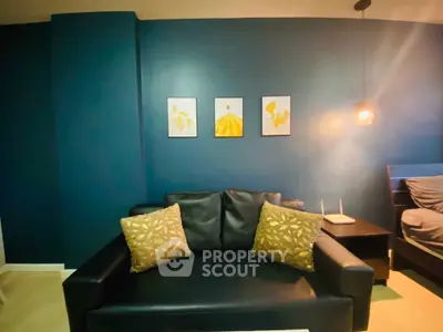 Stylish living room with dark blue accent wall and modern decor