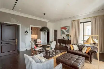 Luxurious living room with elegant decor and modern furniture in a high-end apartment.