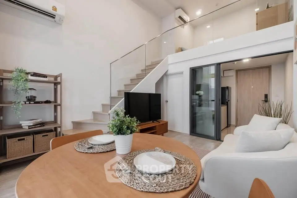 Modern loft-style living room with mezzanine and stylish decor