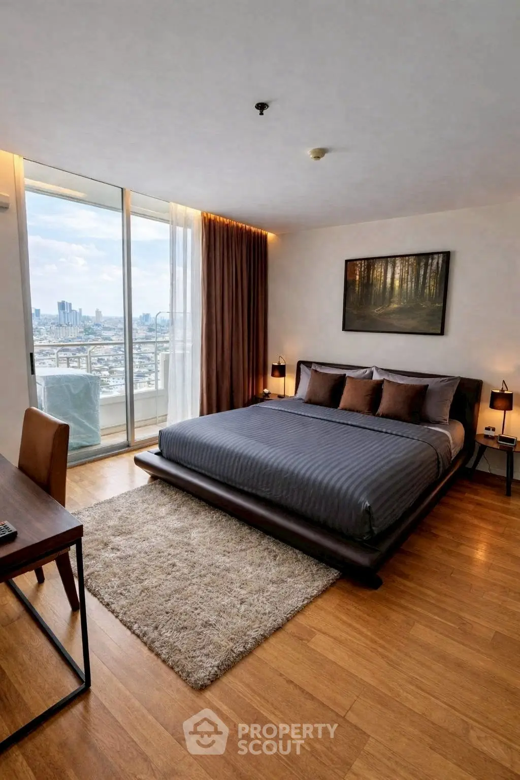 Luxurious bedroom with stunning city view and modern furnishings
