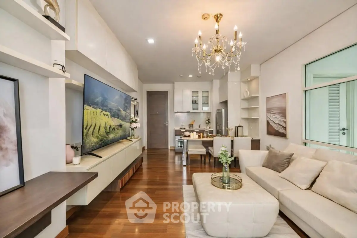 Luxurious living room with elegant chandelier and modern decor