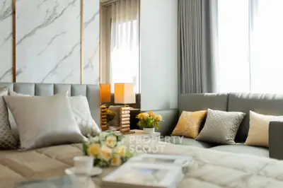 Luxurious modern living room with elegant decor and natural light