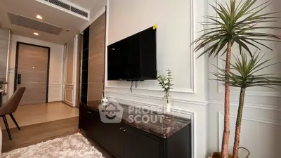 Modern living room with sleek TV setup and stylish decor