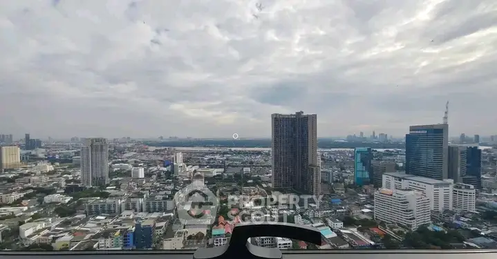 Stunning cityscape view from high-rise building window showcasing urban skyline.
