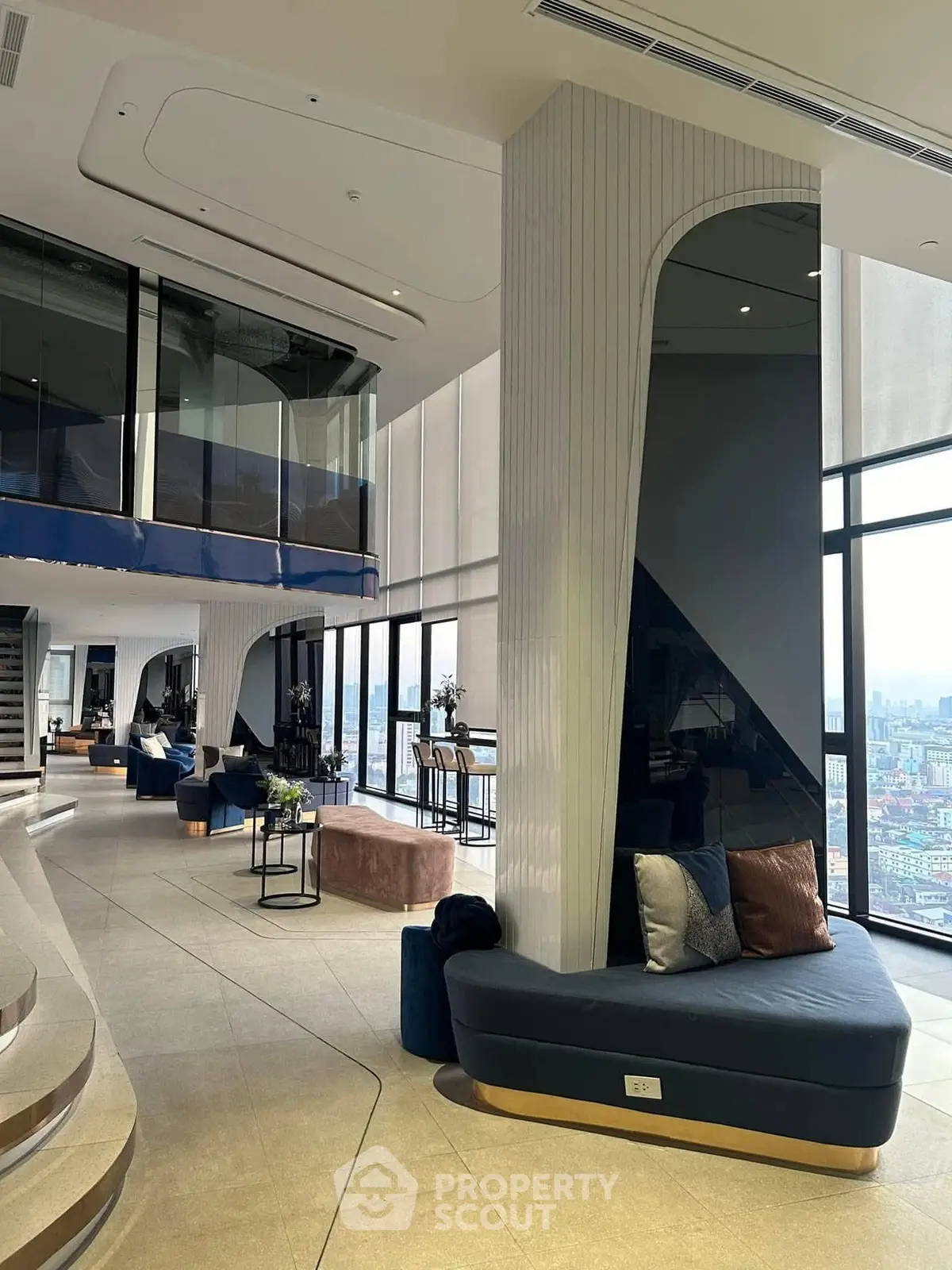 Luxurious modern living room with panoramic city views and stylish decor