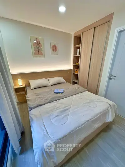 Cozy bedroom with modern decor and built-in wardrobe
