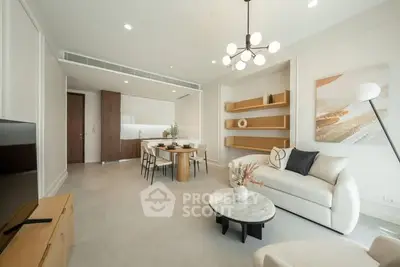 Modern open-plan living room with stylish decor and dining area