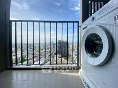 High-rise balcony with city view and washing machine, perfect urban living.