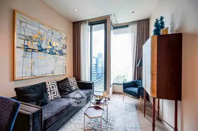 Stylish modern living room with large window and elegant decor