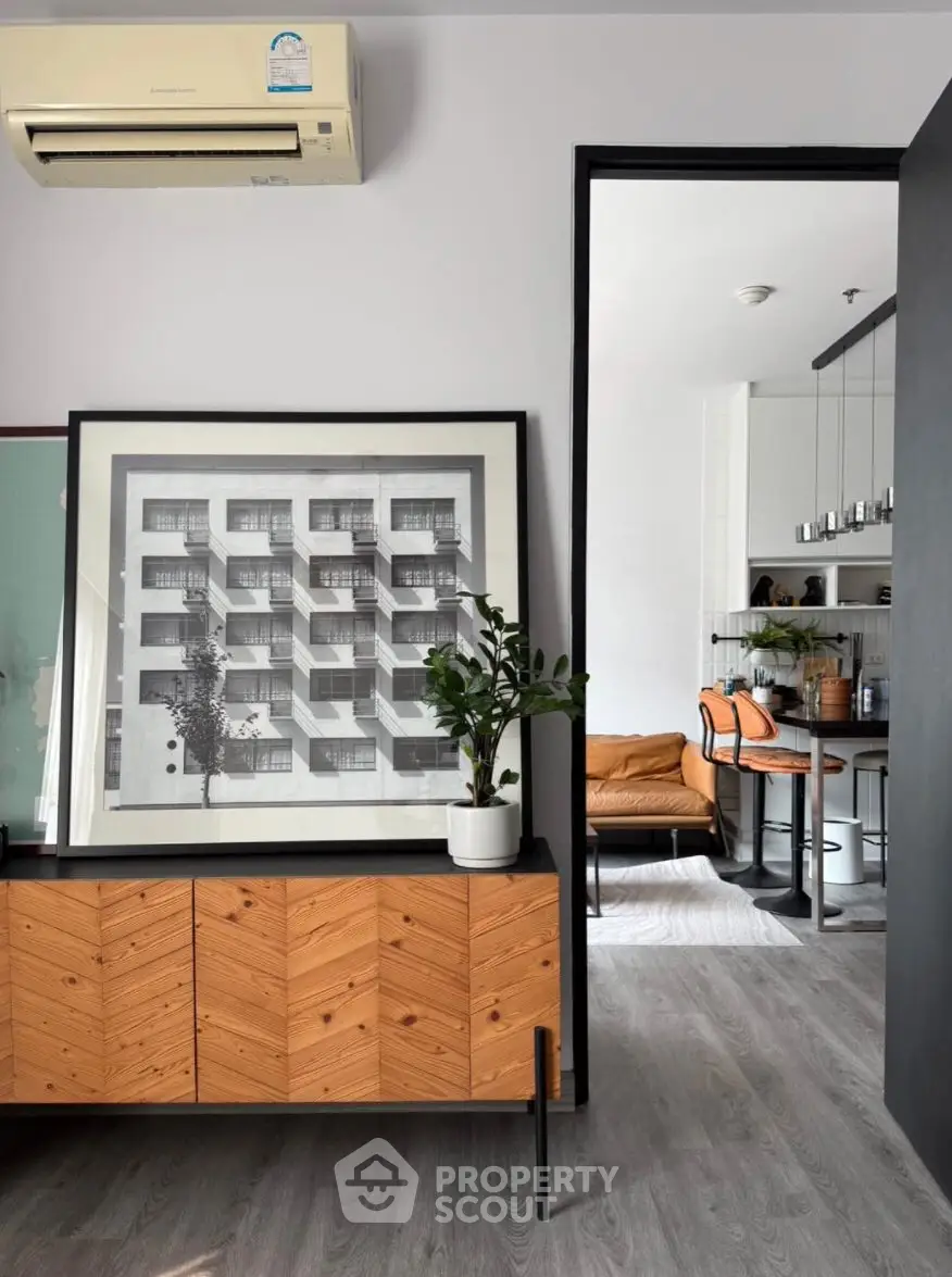 Modern interior with stylish decor and open layout, featuring a cozy living area and contemporary kitchen.