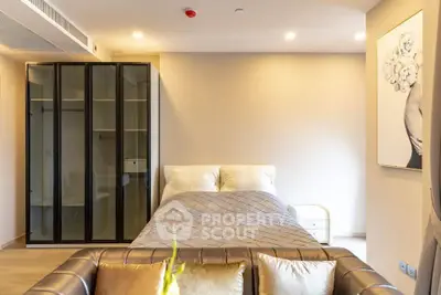 Luxurious bedroom with modern decor and elegant furnishings in a stylish apartment.