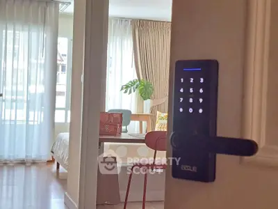Modern apartment interior with digital lock and cozy living space