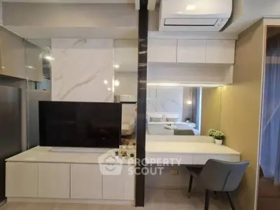 Modern living room with sleek TV unit and stylish decor
