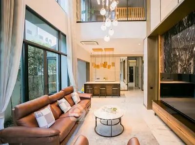 Luxurious modern living room with high ceilings and elegant decor