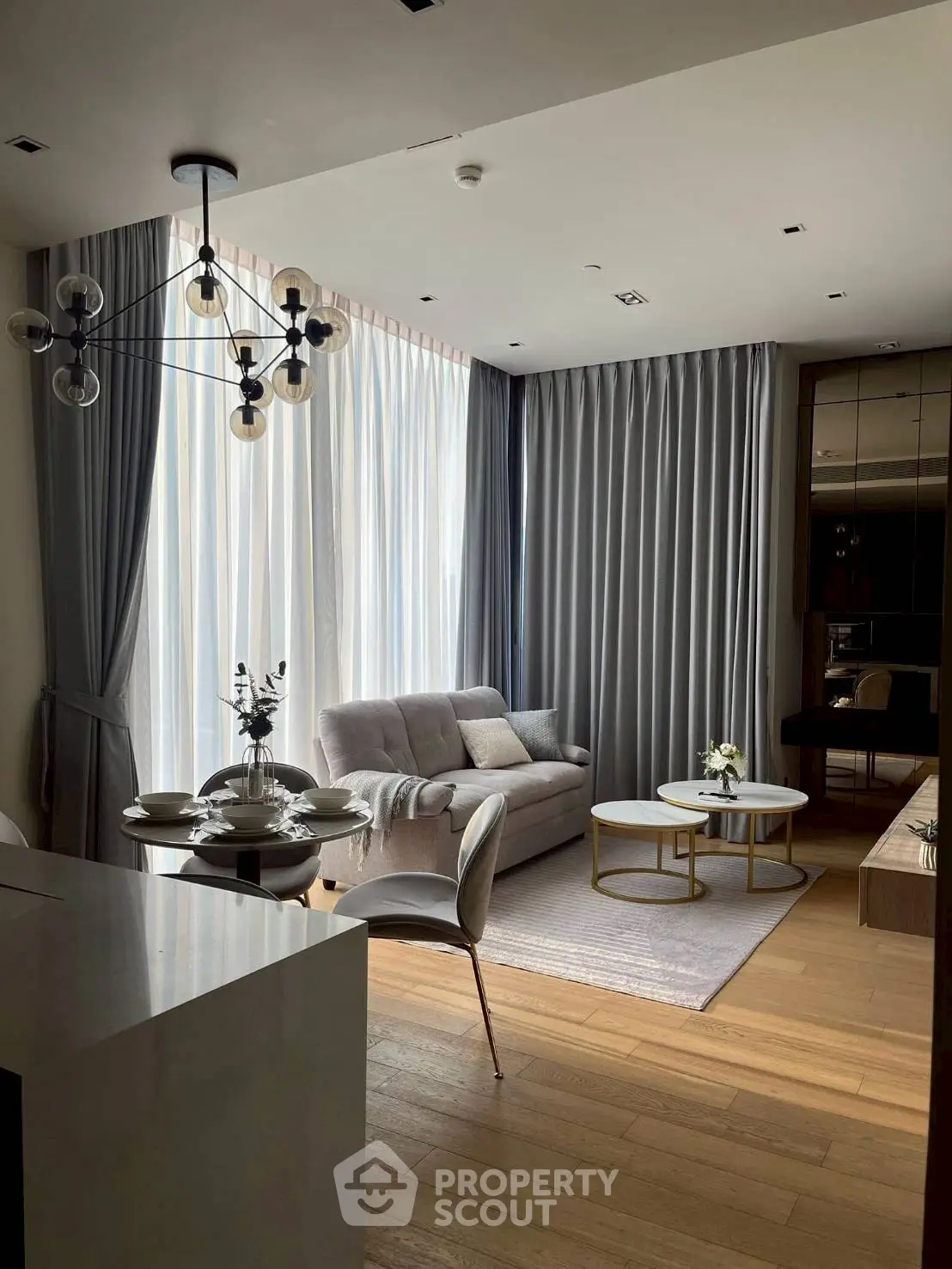 Elegant modern living room with chic decor and natural light