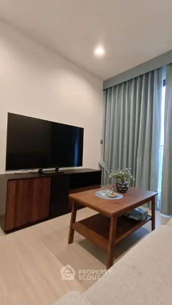 Modern living room with sleek TV setup and elegant decor