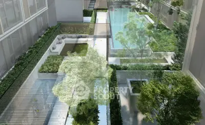 Luxurious modern apartment complex with lush garden and sparkling pool view.