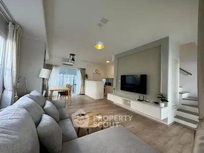Spacious modern living room with open layout and stylish decor