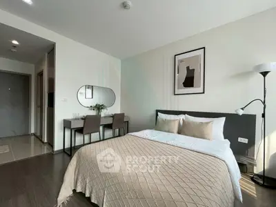 Modern bedroom with stylish decor and natural light