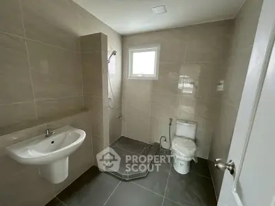 Modern bathroom with sleek tiles and minimalist fixtures