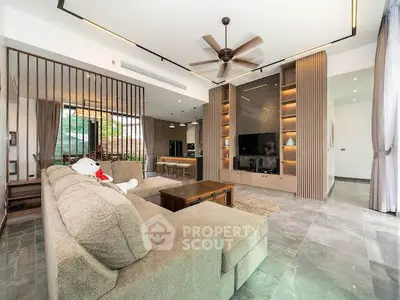 Spacious modern living room with plush sofa and stylish decor