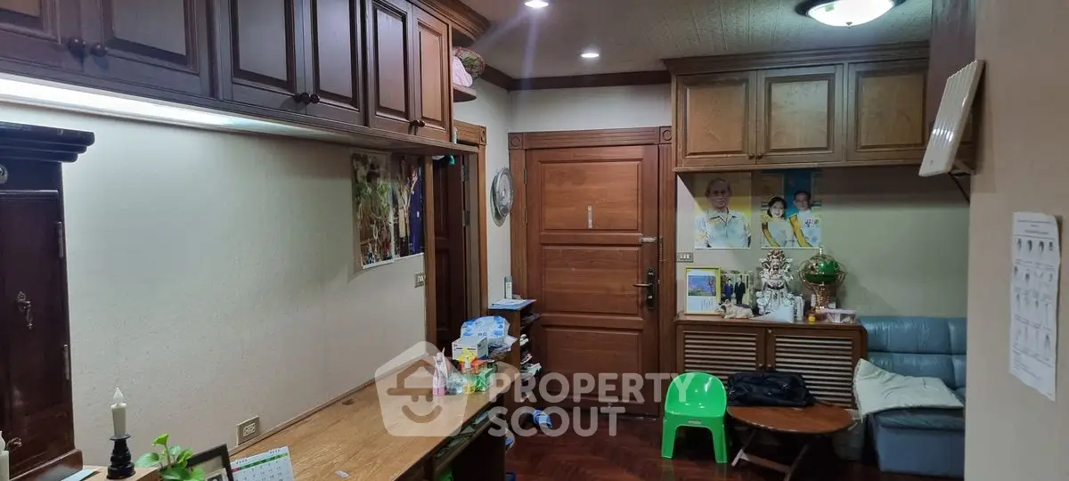 Cozy living room with wooden accents and family-friendly decor