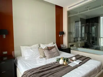 Luxurious modern bedroom with elegant decor and cozy ambiance