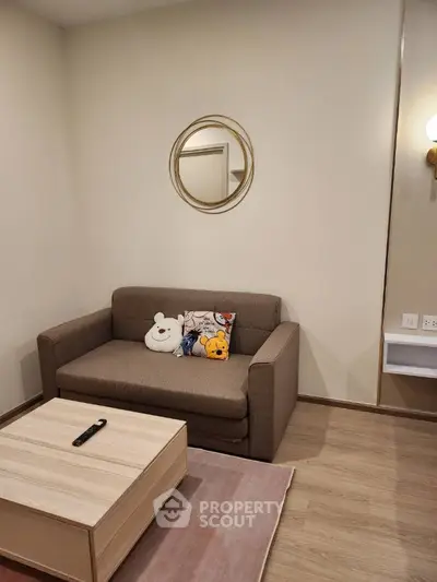 Cozy living room with plush sofa and modern decor