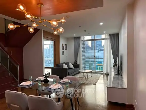 Modern living room with city view, stylish lighting, and elegant dining area in a high-rise apartment.