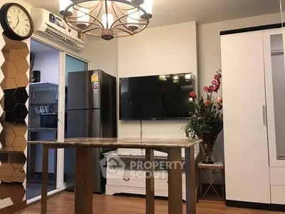 Modern living room with stylish decor and wall-mounted TV