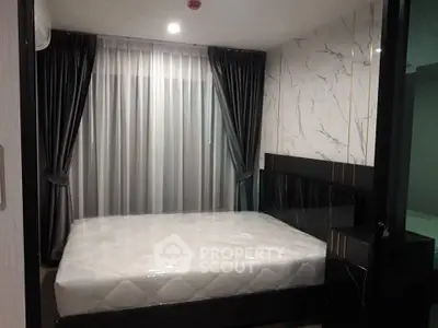 Modern bedroom with elegant marble accent wall and luxurious curtains
