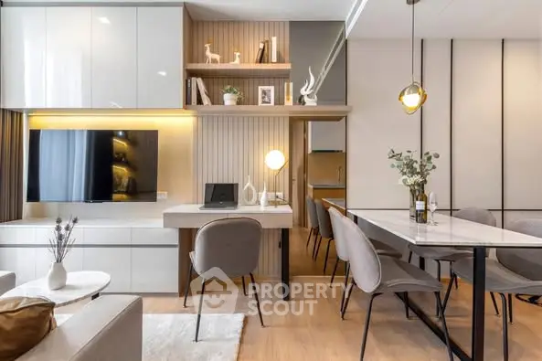 Modern living room with stylish decor and open dining area