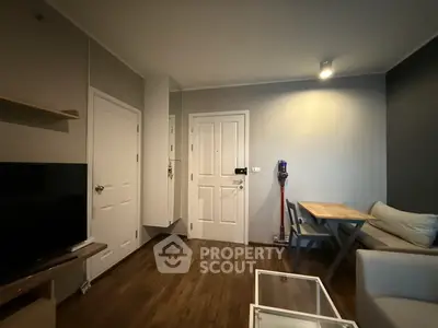 Cozy living room with modern decor and wooden flooring