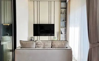 Modern living room with sleek TV setup and elegant decor