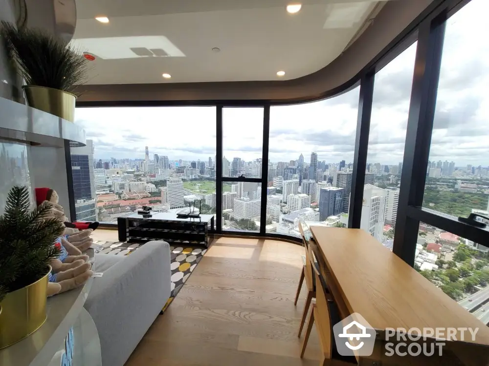 Stunning high-rise apartment with panoramic city views and modern interior design.